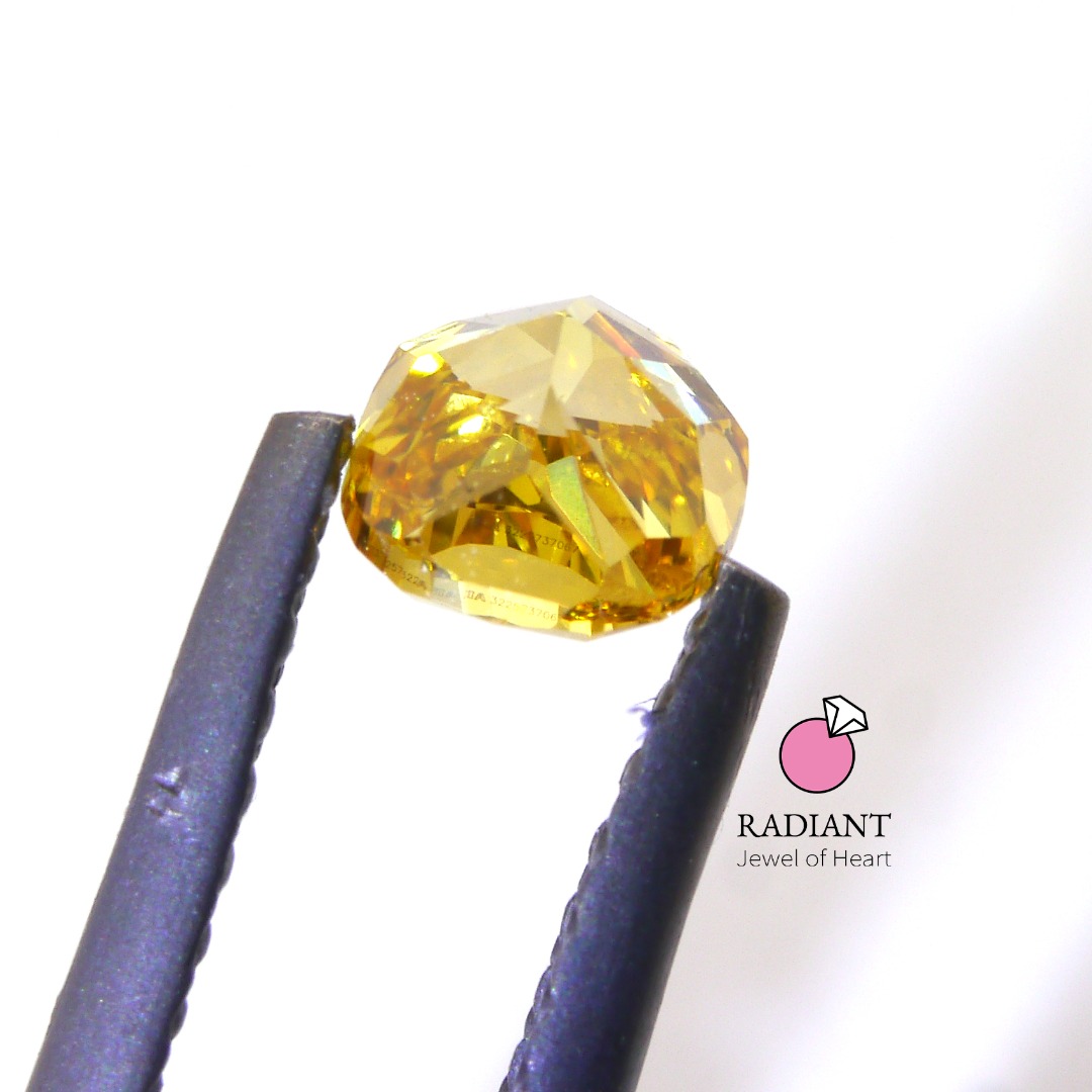 0.51 Fancy Vivid Orangy Yellow SI1 Color Diamond