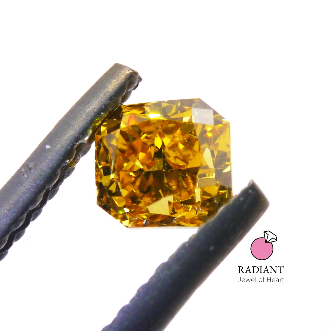 0.52 Natural Fancy Vivid Orangy Yellow VS2 Color Diamond