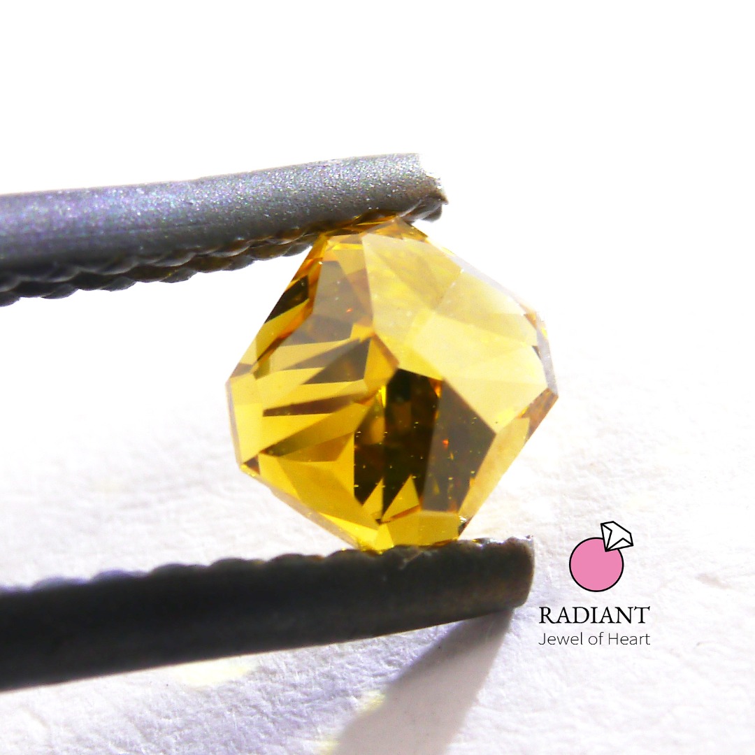 0.52 Natural Fancy Vivid Orangy Yellow VS2 Color Diamond