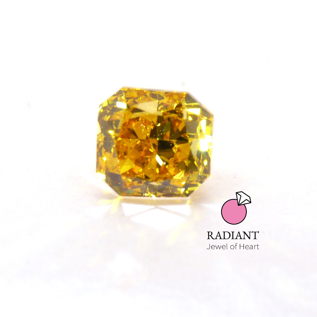 0.52 Natural Fancy Vivid Orangy Yellow VS2 Color Diamond