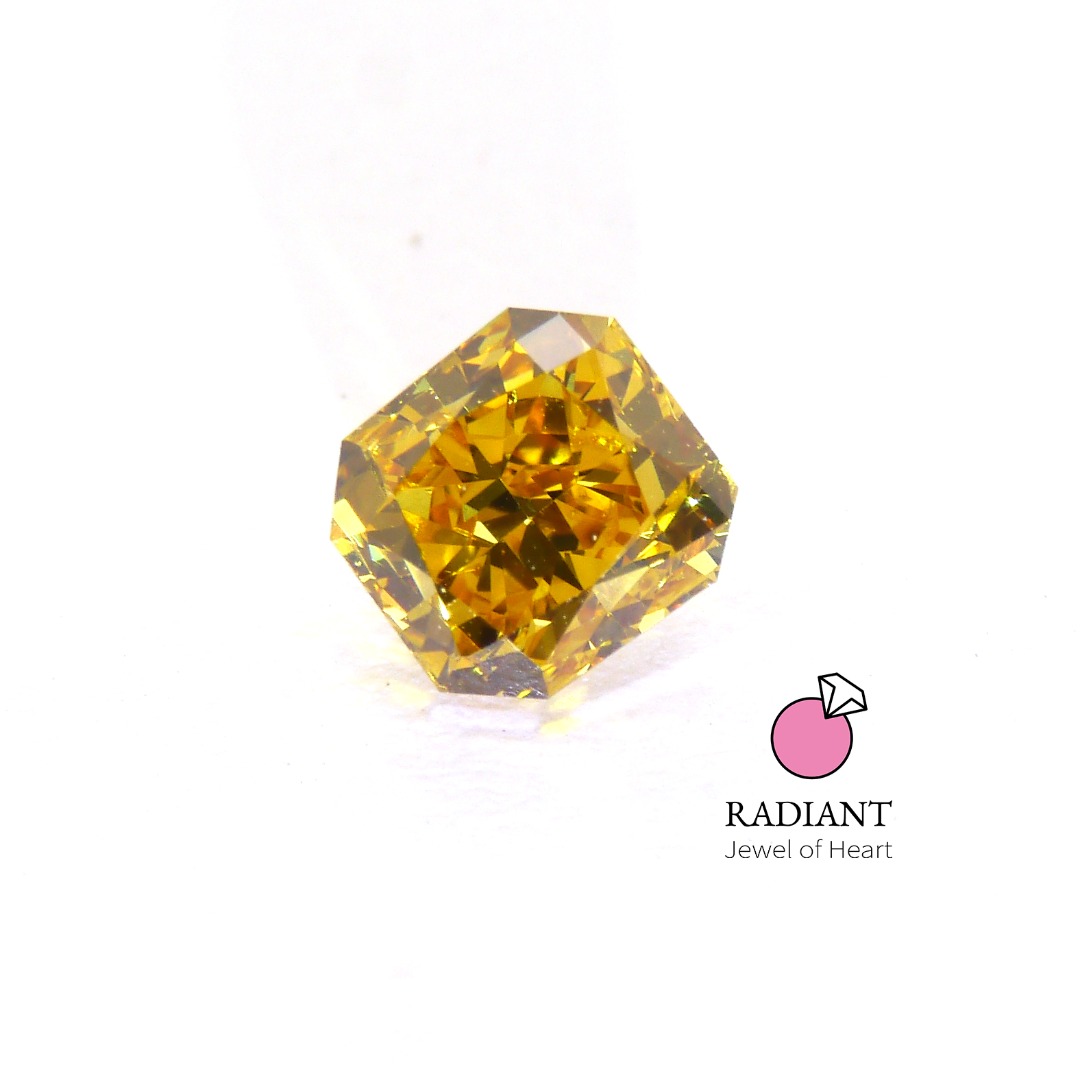 0.52 Natural Fancy Vivid Orangy Yellow VS2 Color Diamond