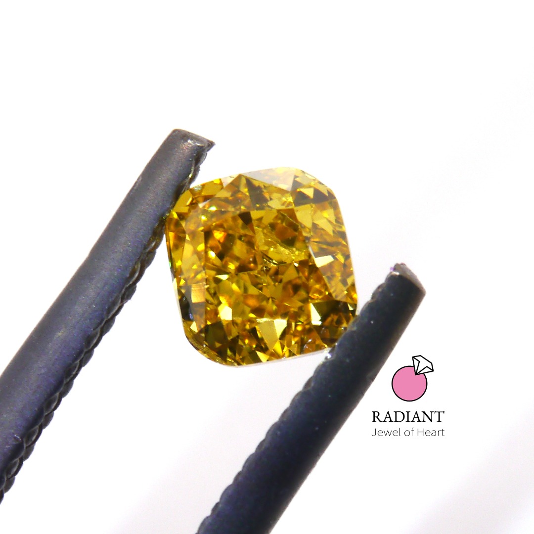 0.50 Natural Fancy Vivid Orangy Yellow SI1 Color Diamond