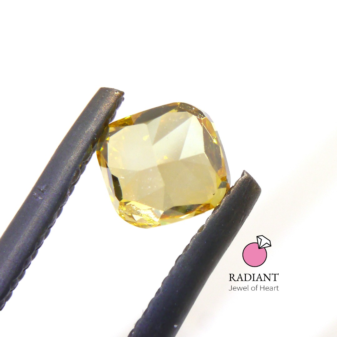 0.50 Natural Fancy Vivid Orangy Yellow SI1 Color Diamond