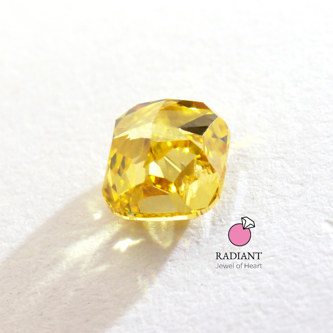 0.50 Natural Fancy Vivid Orangy Yellow SI1 Color Diamond